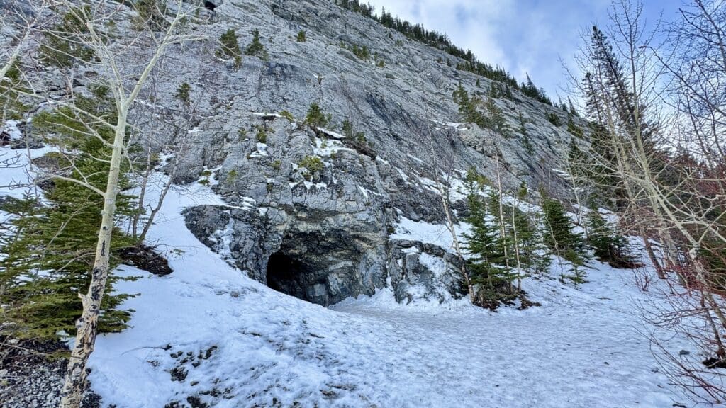 Heart Creek Bunker, a cave at the end of the snow-covered Heart Creek Bunker trail Kananaskis