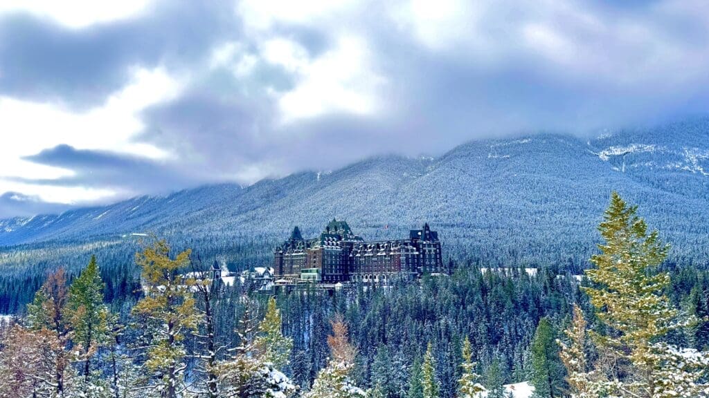 Banff Springs Hotel in Banff National Park beside mountain from Surprise Corner Viewpoint